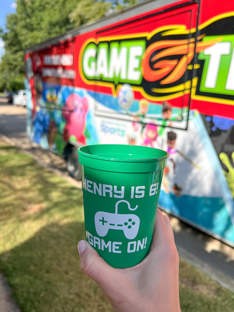 Henry is 6- game on green plastic party cups