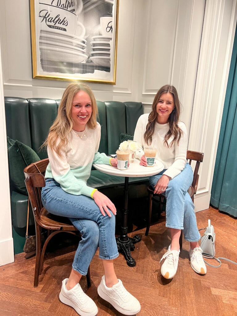 two women enjoying coffee together