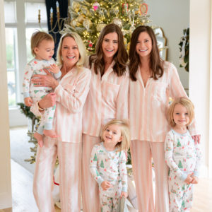 family group in matching christmas pajamas